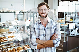 Selfassured waiter smiling