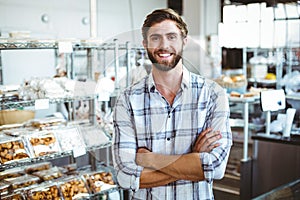 Selfassured waiter smiling