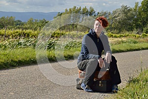 Selfconfident red-haired woman on vacation