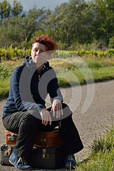 Selfconfident red-haired woman on vacation