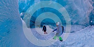 SELFIE: Active tourists explore the stunning ice caverns in British Columbia.