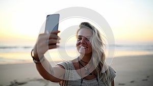 Selfie, beach and happy woman in nature with freedom, journey or adventure, fun or explore. Smartphone, photography or