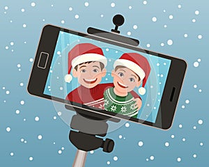 Selfie capture of two kids for Christmas greeting.