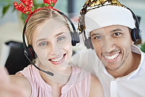 Selfie, christmas and call center with a man and woman consultant team working in customer service. Face, crm and