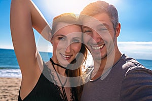 Selfie couple with sun