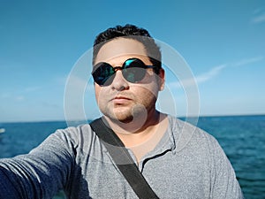 Selfie fat man with glasses