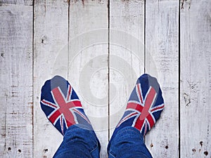 Selfie feet wearing socks with British flag pattern