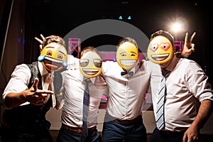 Selfie friends group bachelor party men emoji mask photo