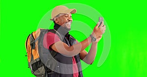 Selfie, green screen and black man with phone for travel photography on adventure, journey or hiking with backpack