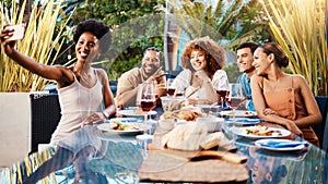 Selfie, group of friends at lunch in garden and party at table with diversity, food and wine together. Photography, men