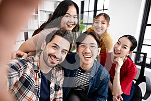 Selfie of group young man and woman team smiling having fun together