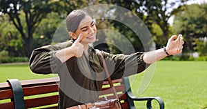 Selfie, hand gesture and woman on bench at park taking pictures for social media influencer. Summer, profile picture and
