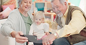 Selfie, happy and senior couple with their grandchild bonding, playing and spending time at home. Happiness, smile and