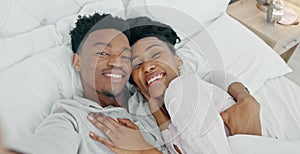 Selfie influencer couple in bed and portrait smile for fun indoor weekend or waking up together in the morning. Fun