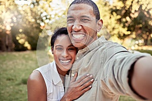 Selfie, love and garden with a black couple taking a photograph while standing outdoor together in the yard. Portrait