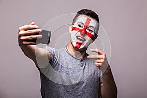 Selfie on phone of Englishman football fans in game supporting of England national teams