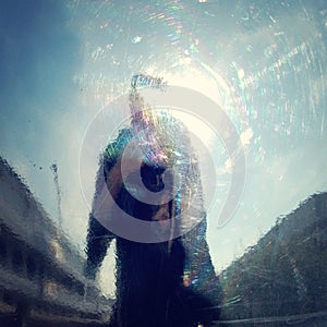 Selfie in a shiny metal object - vintage effect