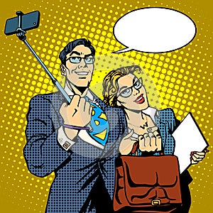 Selfie stick businessman and businesswoman photo