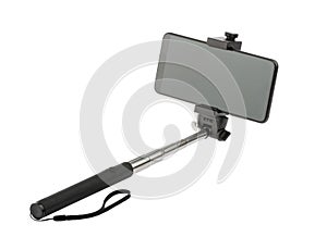 Selfie stick with phone isolated without shadow clipping path