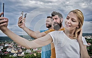 Selfie time. Life online. People taking selfie or streaming video. Mobile internet social networks. Mobile dependency