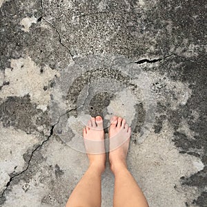 Selfie of woman bare feet on floor