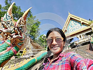 Selfie woman travel Wat Khao Rang, Phuket, Thailand