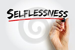 Selflessness - concern more with the needs and wishes of others than with one\'s own, text concept background photo