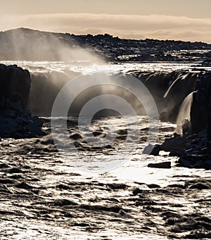 Selfoss waterfall back light long exposure in Iceland