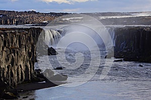 Selfoss Waterfall on River Jokulsa a Fjollum in Northern Iceland - 11m tall and 100m wide
