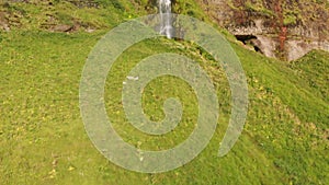 Seljaland Waterfall, aka Seljalandsfoss, panoramic aerial view on a sunny summer day, Iceland