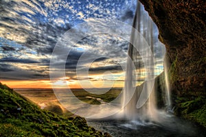 Seljalandfoss waterfall at sunset in HDR, Iceland