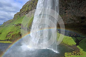 Seljalandsfoss Waterfall with Beautiful Rainbow in Southern Iceland