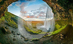 Seljalandsfoss waterfall at dawn wide panorama in Iceland