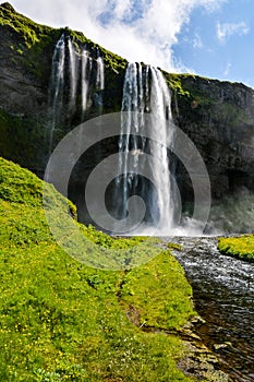 Seljalandsfoss waterfall, Iceland - uncrowded side view photo
