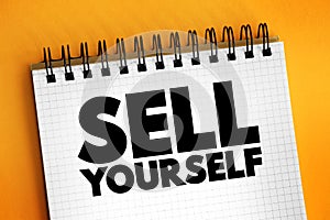 Sell Yourself text on notepad, concept background