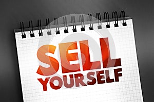 Sell Yourself text on notepad, concept background