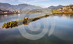 The Sella river arriving at its mouth in the Cantabrian sea in R