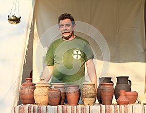 Seller of ceramics