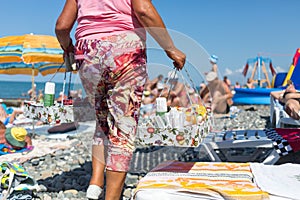 seller of fruit salads on the photo