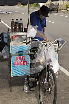 The seller of Warm cake or called Roti anget