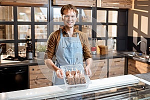 Seller wroking in the ice cream shop