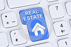 Selling or buying a real estate home icon online on the computer photo
