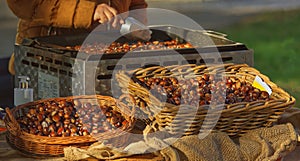 Selling edible chestnuts at street food market