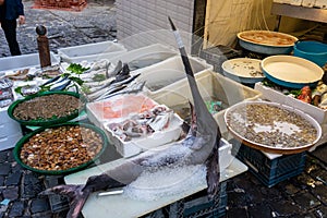 selling fish and seafood on the streets of the Italian city of Naples.