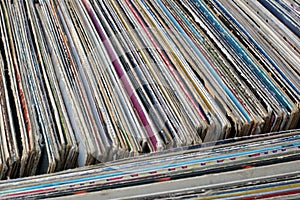Stack of used vinyl records in covers put on sale