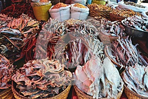 Selling salty fish at rural market