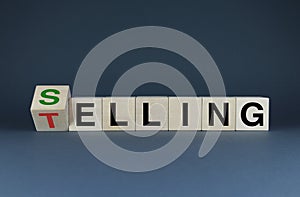 Selling or Telling. The cubes form the words Selling or Telling