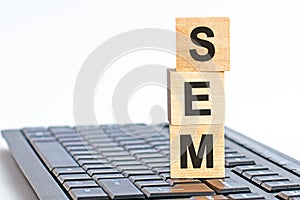SEM - acronym from wooden blocks with letters, concept. SEM - search engine marketing