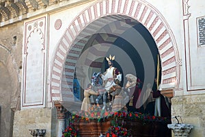 Semana Santa pasos leaving the Mezquita in Cordoba, Spain.