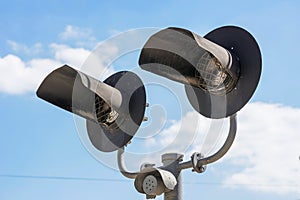 Semaphore signal at a railway crossing. Railway level crossing, semaphore, stop sign, road intersection